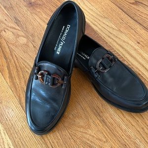 Donald Pliner black calf leather loafers with tortoise bit detail